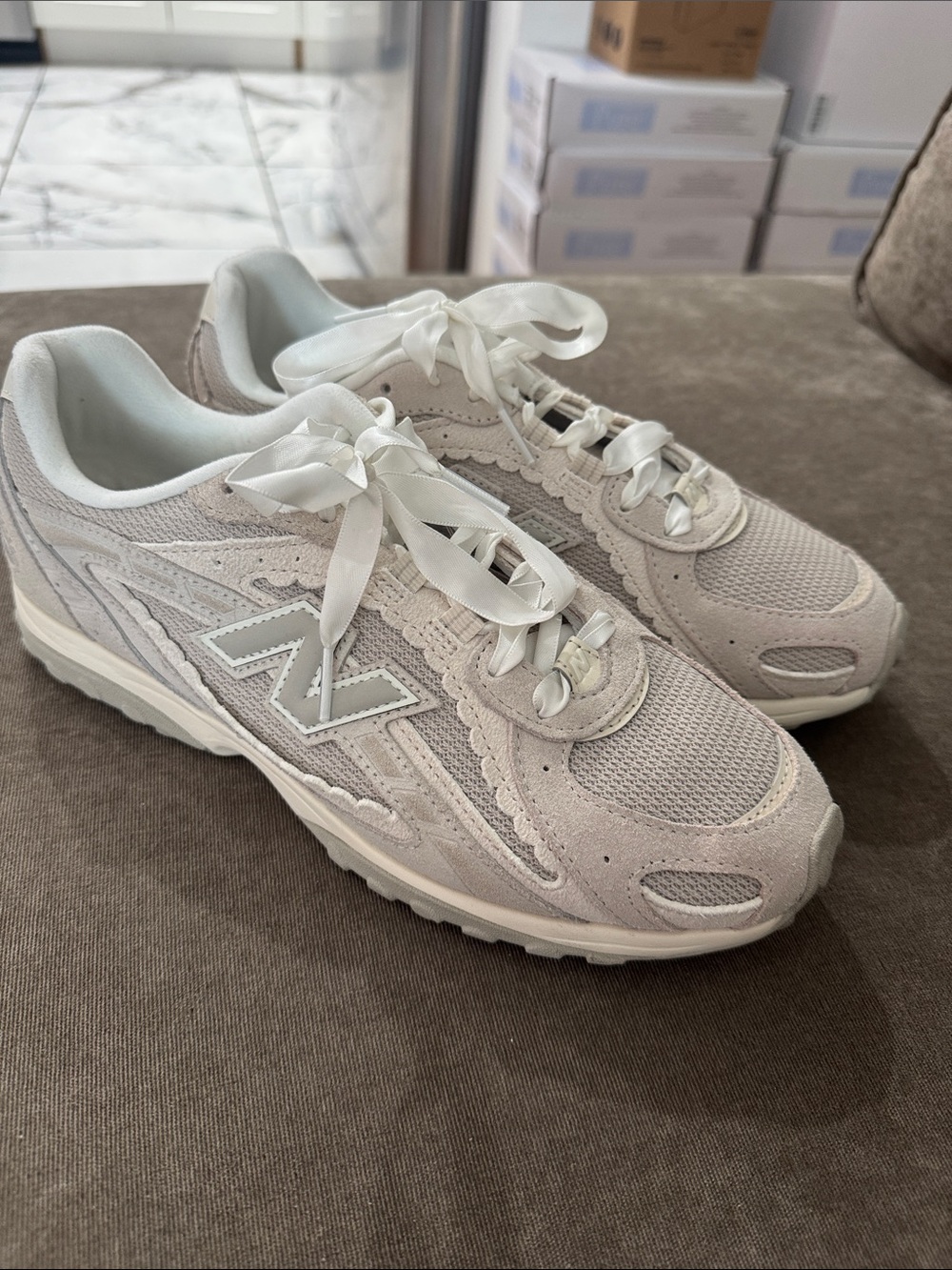 New Balance Women's Lace-Up Sneakers in Cream and White Satin